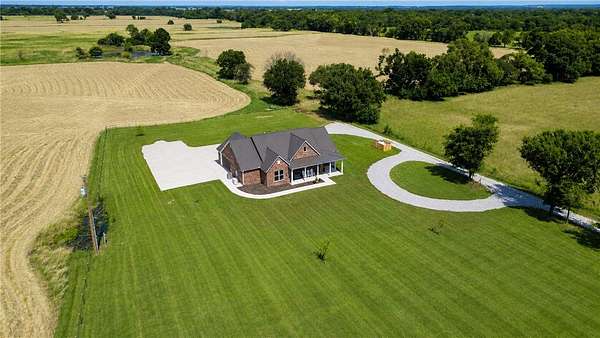 35 Acres of Agricultural Land with Home for Sale in Maysville, Arkansas