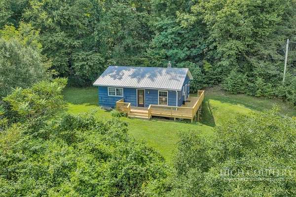 1.5 Acres of Land with Home for Sale in Vilas, North Carolina
