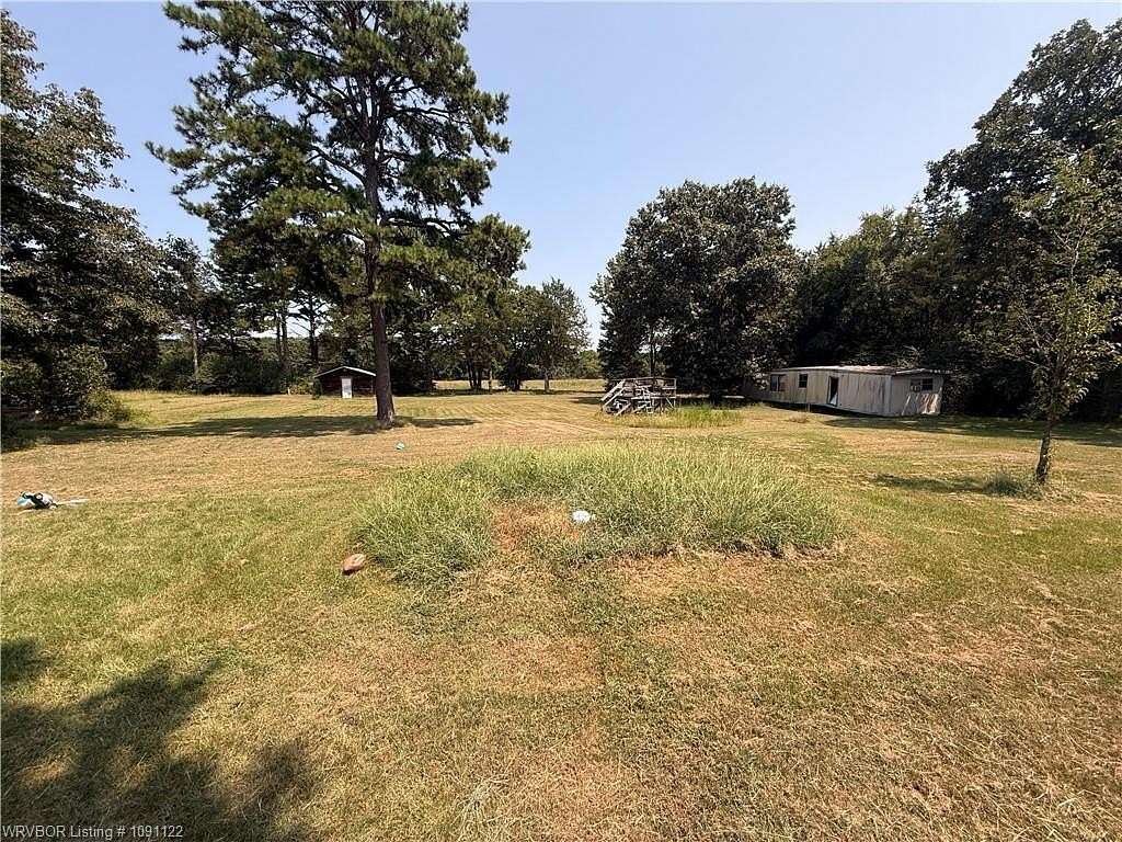 7 Acres of Land with Home for Sale in Rudy, Arkansas
