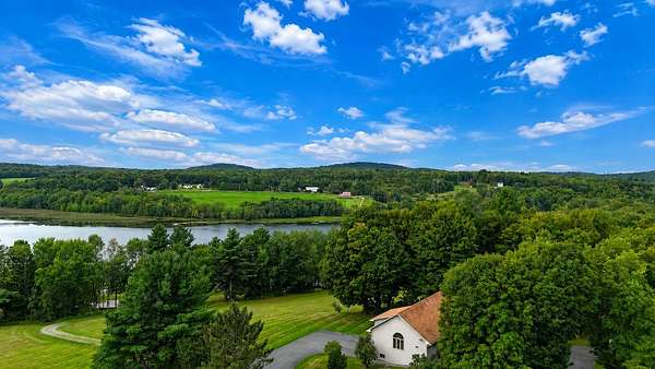 3.84 Acres of Land with Home for Sale in Derby Town, Vermont