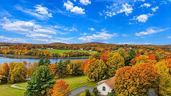 3.84 Acres of Land with Home for Sale in Derby Town, Vermont