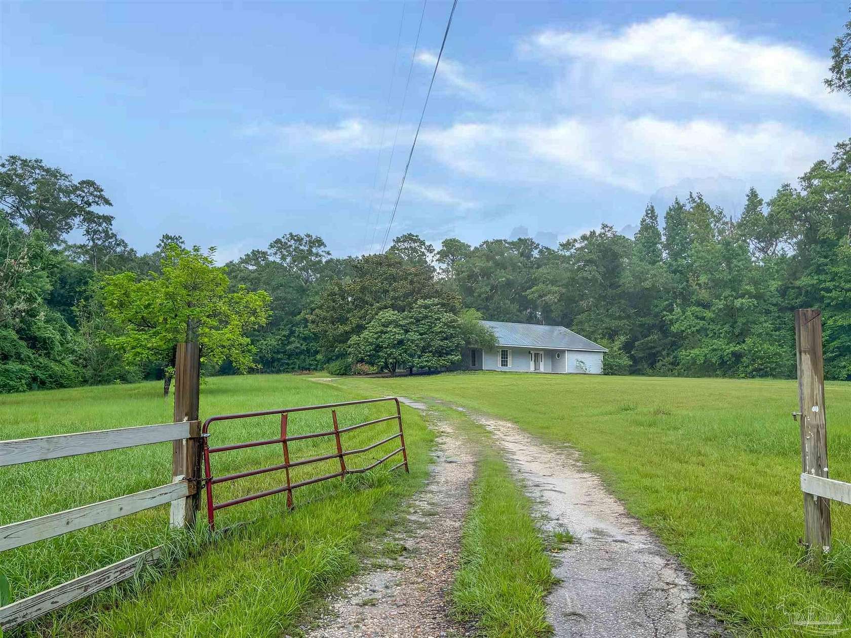 3.32 Acres of Land with Home for Sale in Cantonment, Florida