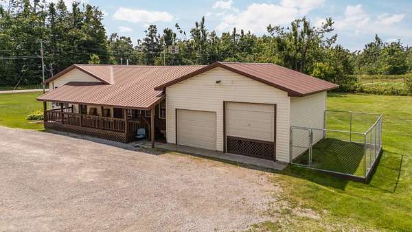 10 Acres of Recreational Land with Home for Sale in Gaylord, Michigan
