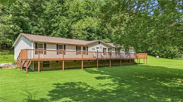 4.4 Acres of Land with Home for Sale in Millers Creek, North Carolina