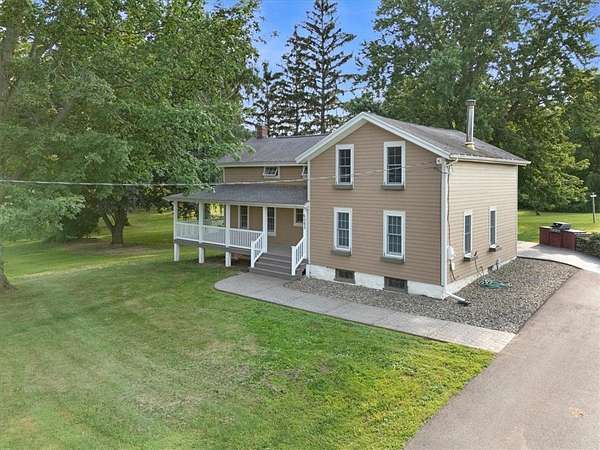 4.82 Acres of Land with Home for Sale in Williamson, New York