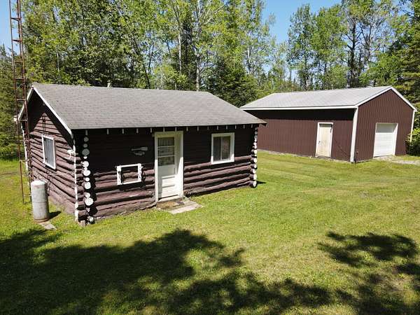 159 Acres of Recreational Land with Home for Sale in Lincoln, Michigan
