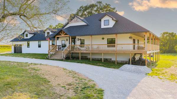 20.7 Acres of Land with Home for Sale in Everton, Missouri