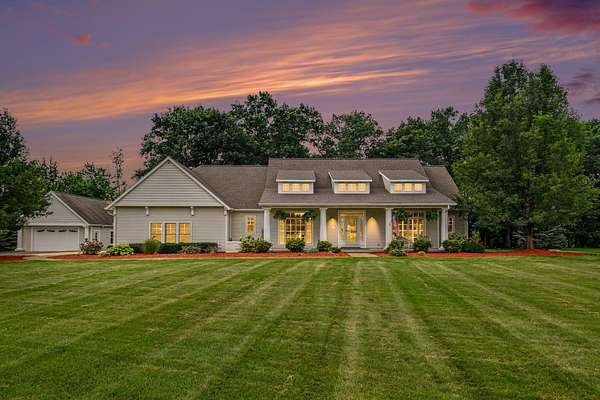 2 Acres of Land with Home for Sale in Coopersville, Michigan