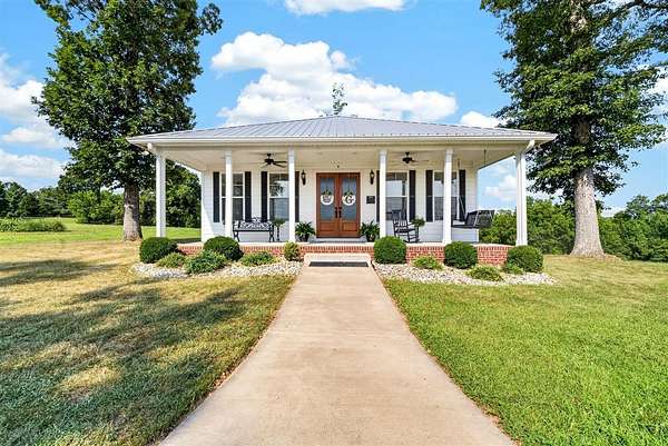 30.7 Acres of Land with Home for Sale in Scottsville, Kentucky