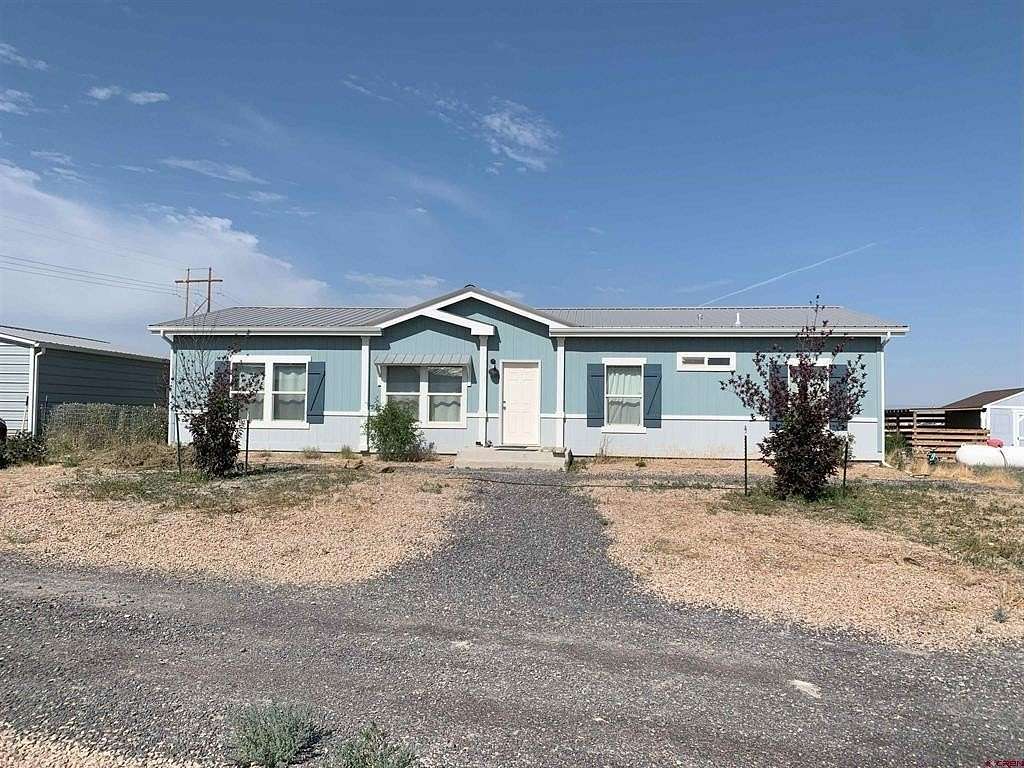 3.25 Acres of Land with Home for Sale in Delta, Colorado