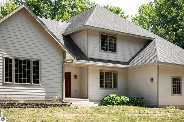 8.69 Acres of Land with Home for Sale in Williamsburg, Michigan
