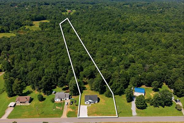 5 Acres of Land with Home for Sale in Charlotte, Tennessee