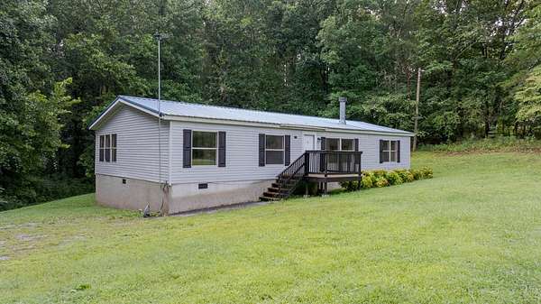 5 Acres of Land with Home for Sale in Spring City, Tennessee