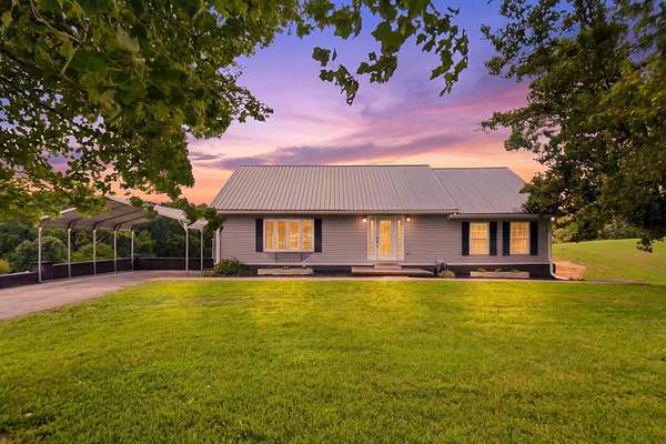 2 Acres of Land with Home for Sale in Irvine, Kentucky
