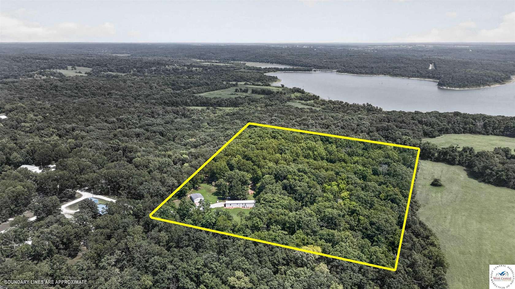 8.42 Acres of Land with Home for Sale in Warsaw, Missouri