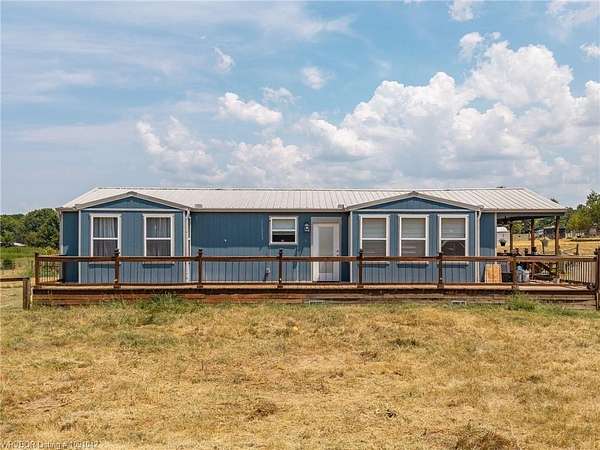 7.4 Acres of Land with Home for Sale in Spiro, Oklahoma