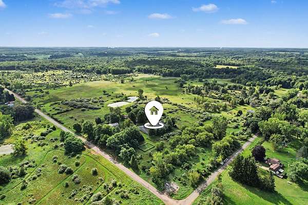 166 Acres of Land with Home for Sale in Albion, Michigan