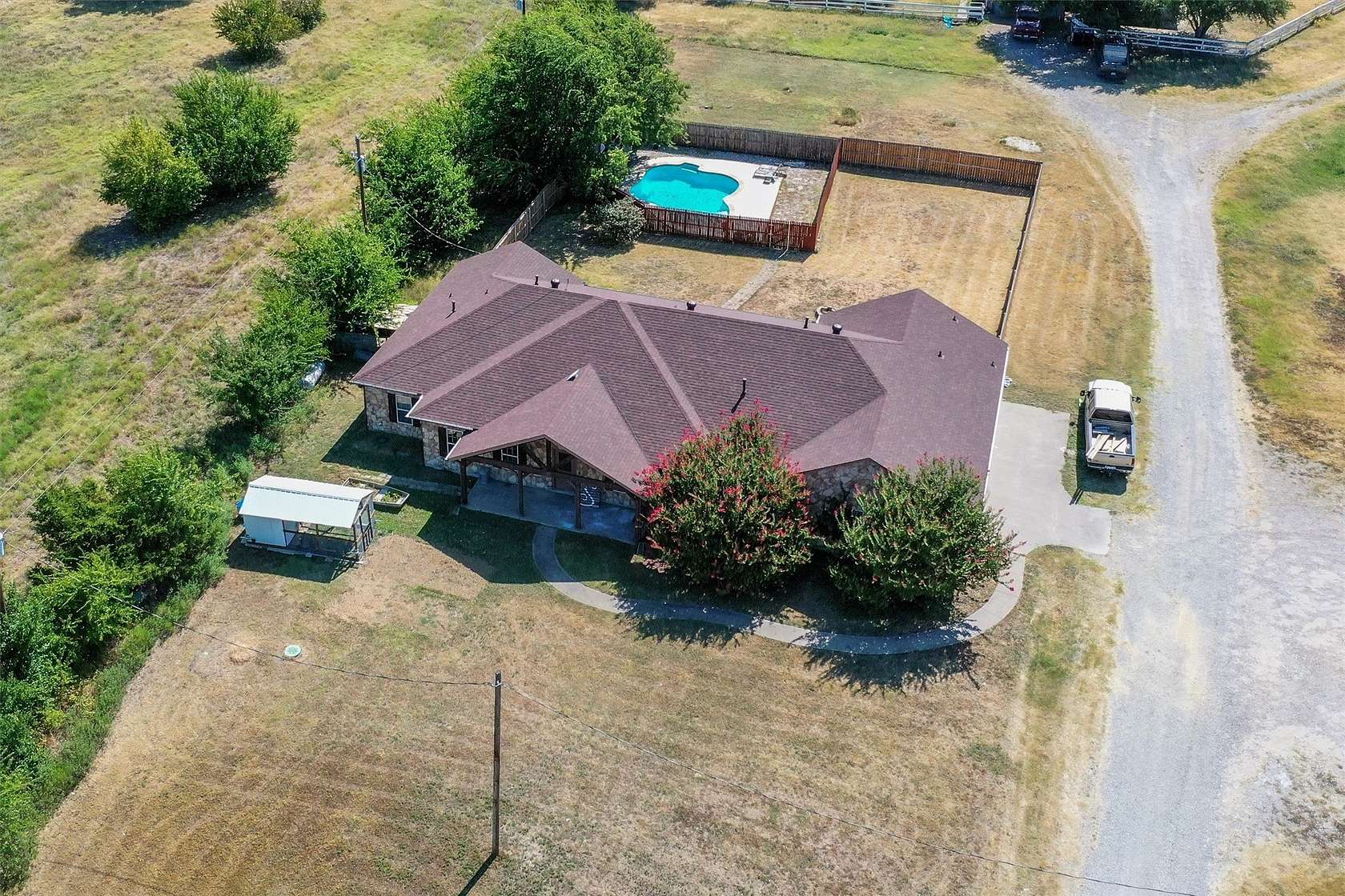 1.87 Acres of Land with Home for Sale in Leonard, Texas