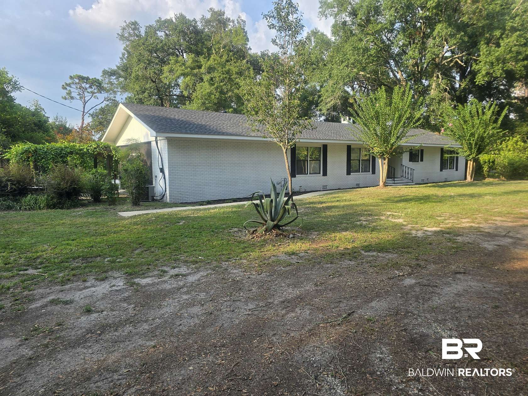 1.55 Acres of Land with Home for Sale in Foley, Alabama