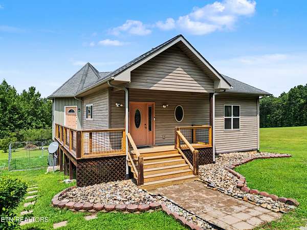 10.4 Acres of Land with Home for Sale in Oneida, Tennessee