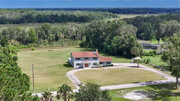 2.46 Acres of Land with Home for Sale in Inverness, Florida