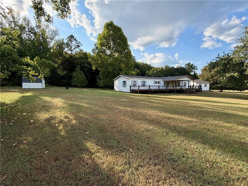 6.8 Acres of Land with Home for Sale in New Blaine, Arkansas