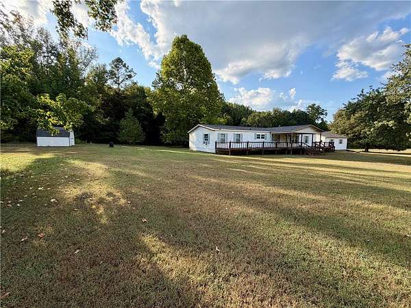 6.8 Acres of Land with Home for Sale in New Blaine, Arkansas