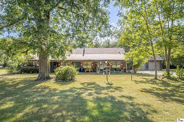 9 Acres of Land with Home for Sale in Grayson, Louisiana