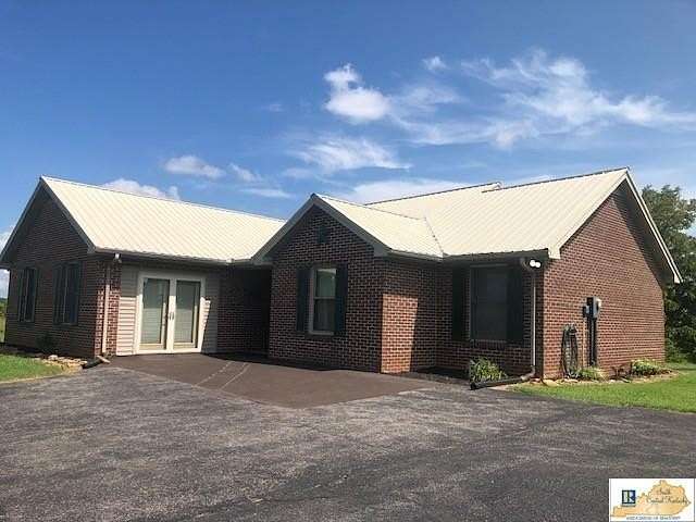 1.68 Acres of Land with Home for Sale in Tompkinsville, Kentucky