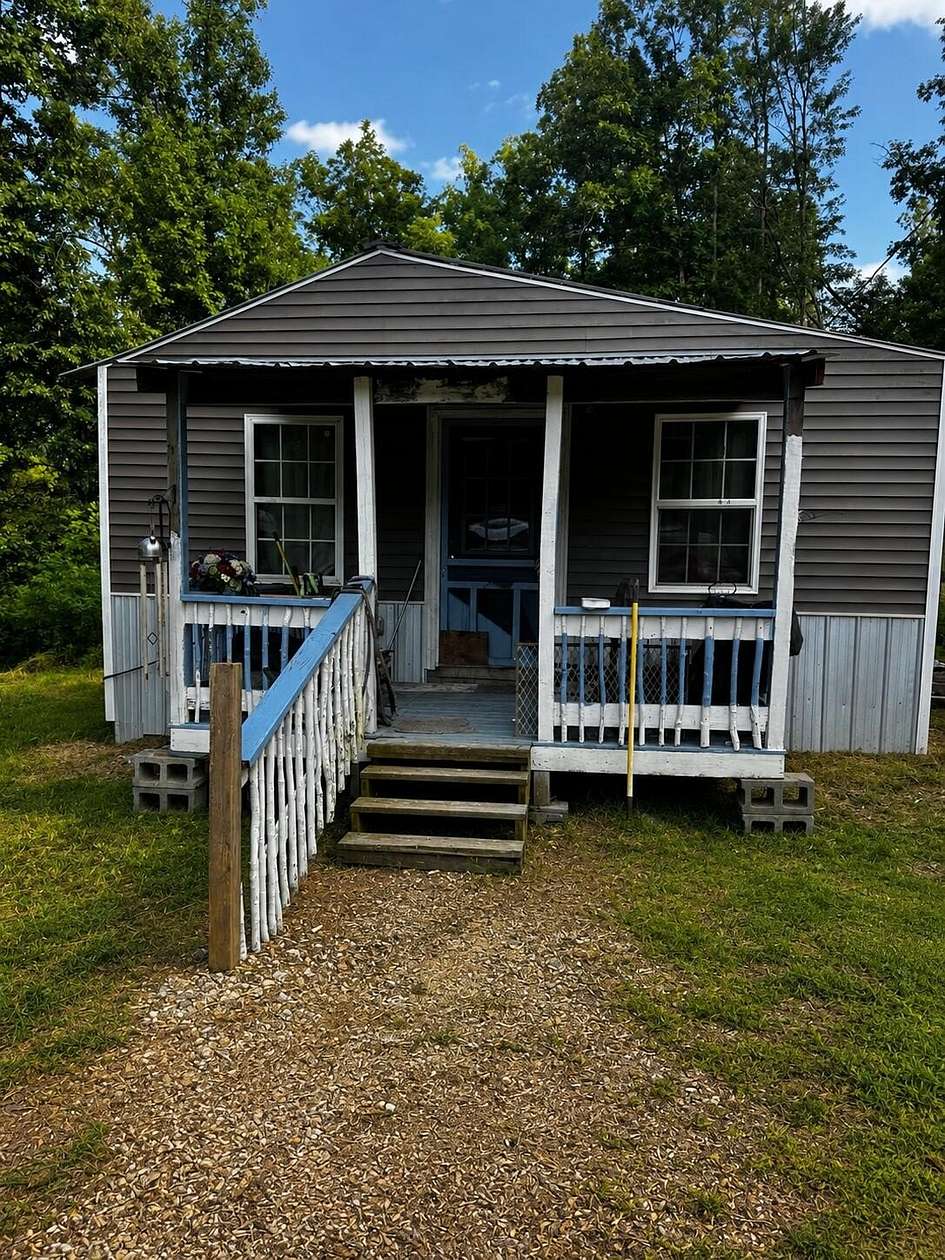 32.8 Acres of Recreational Land with Home for Sale in Pine Knot, Kentucky