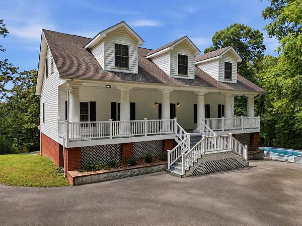 10.9 Acres of Land with Home for Sale in Birchwood, Tennessee