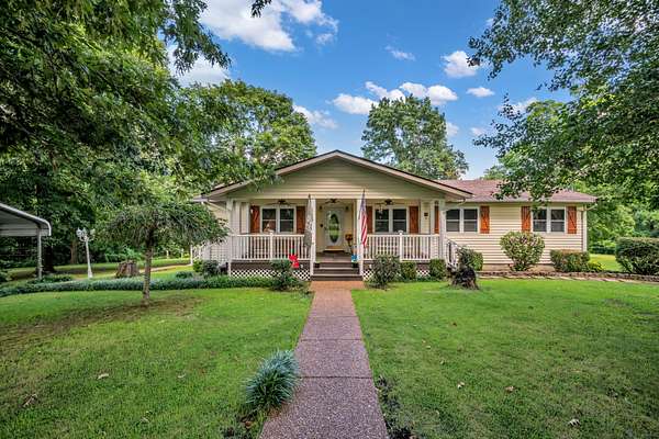 5.57 Acres of Land with Home for Sale in Bon Aqua, Tennessee