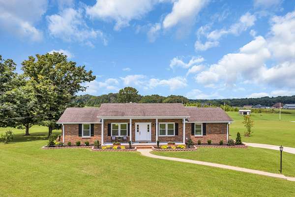 4.3 Acres of Land with Home for Sale in Burns, Tennessee