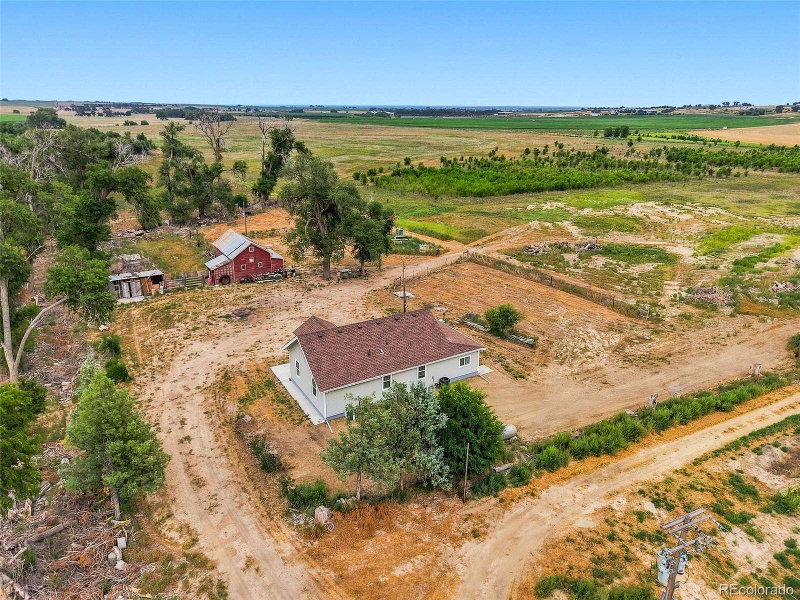 80 Acres of Land with Home for Sale in Fort Morgan, Colorado