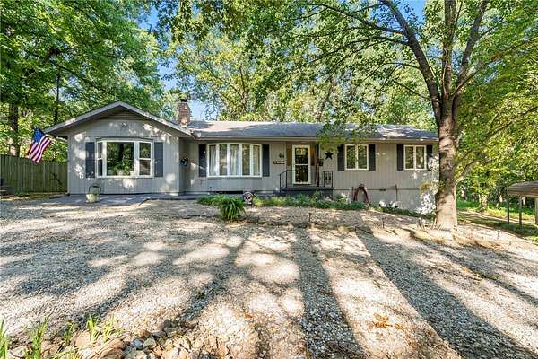4.7 Acres of Land with Home for Sale in Gravette, Arkansas