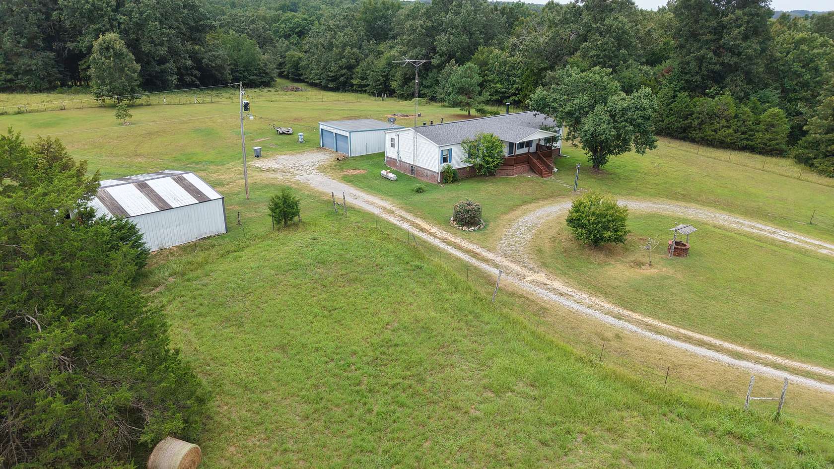10 Acres of Land with Home for Sale in Sidney, Arkansas