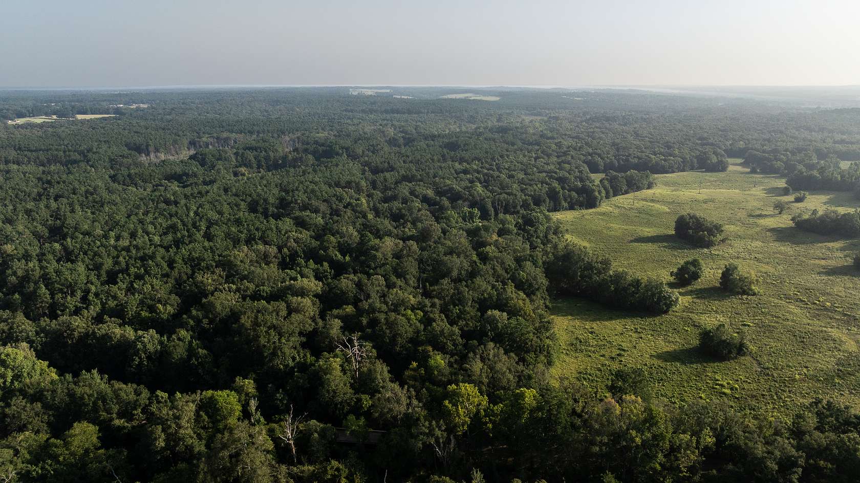 328 Acres of Land with Home for Sale in Laneville, Texas