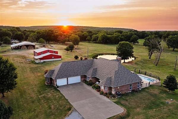 155 Acres of Land with Home for Sale in Henryetta, Oklahoma