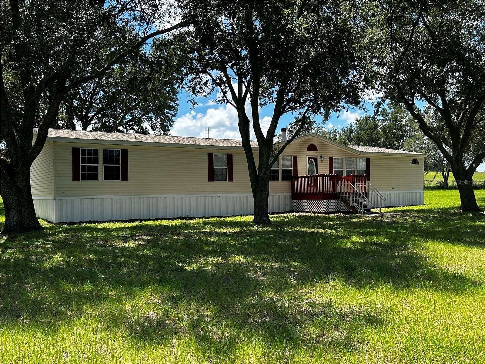 2.33 Acres of Land with Home for Sale in Zephyrhills, Florida