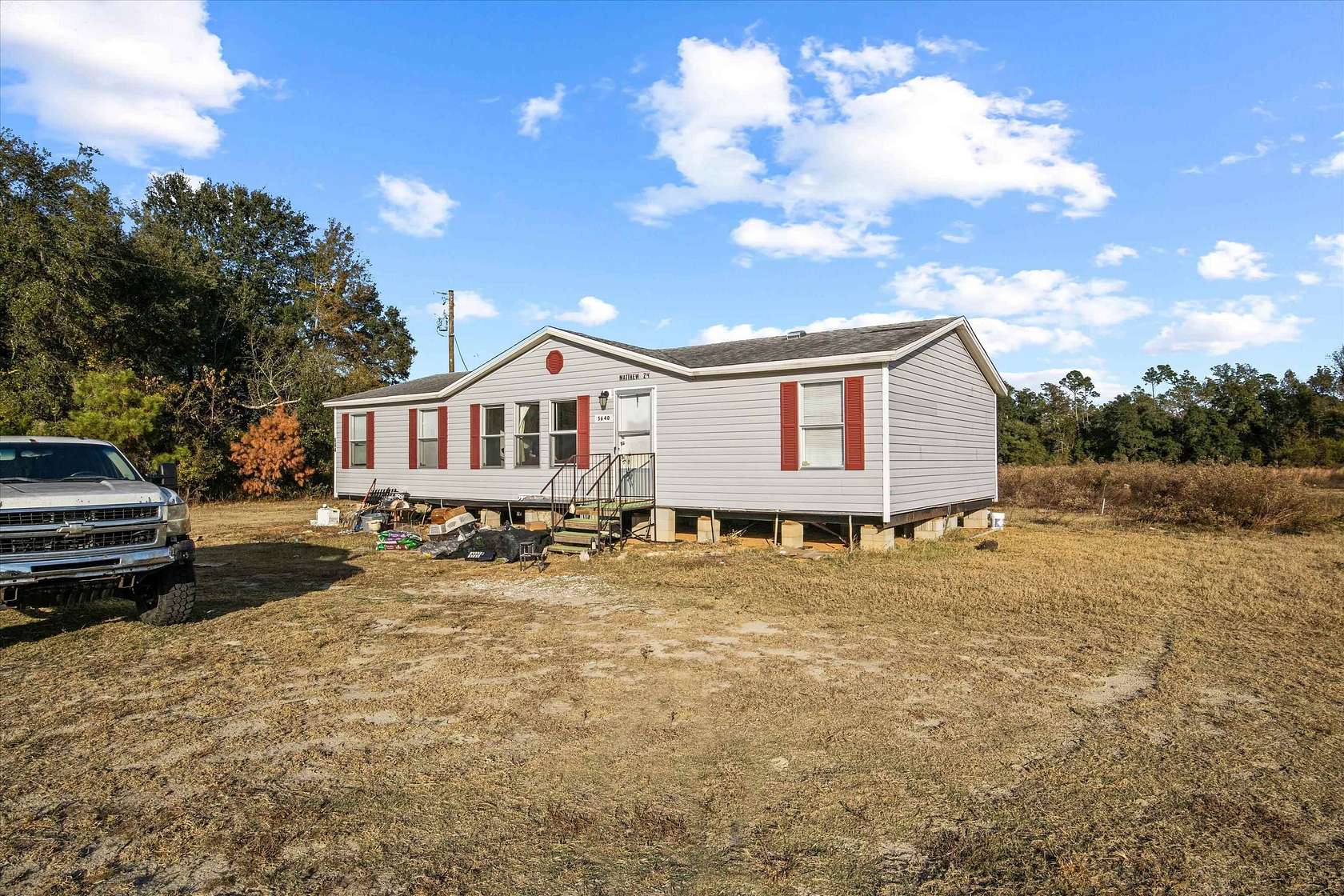 20 Acres of Agricultural Land with Home for Sale in Grand Ridge, Florida