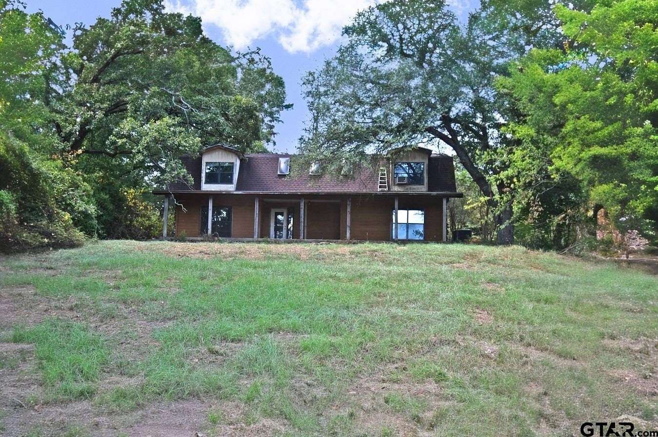 10 Acres of Land with Home for Sale in Quitman, Texas