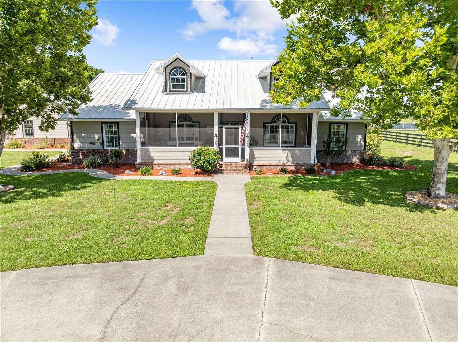2.5 Acres of Land with Home for Sale in St. Cloud, Florida