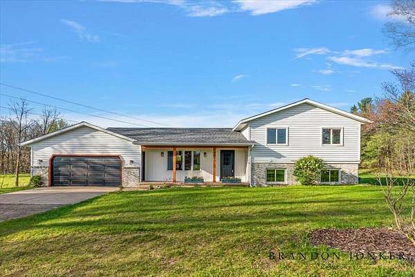 4 Acres of Land with Home for Sale in Alto, Michigan