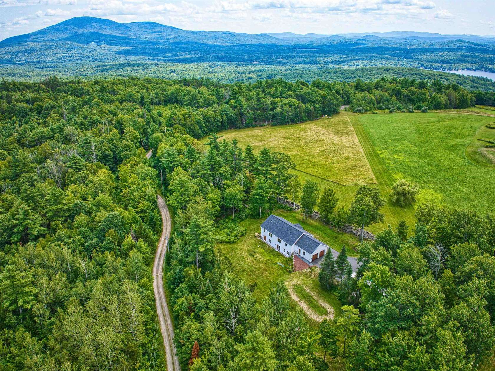 6 Acres of Land with Home for Sale in Wilmot, New Hampshire
