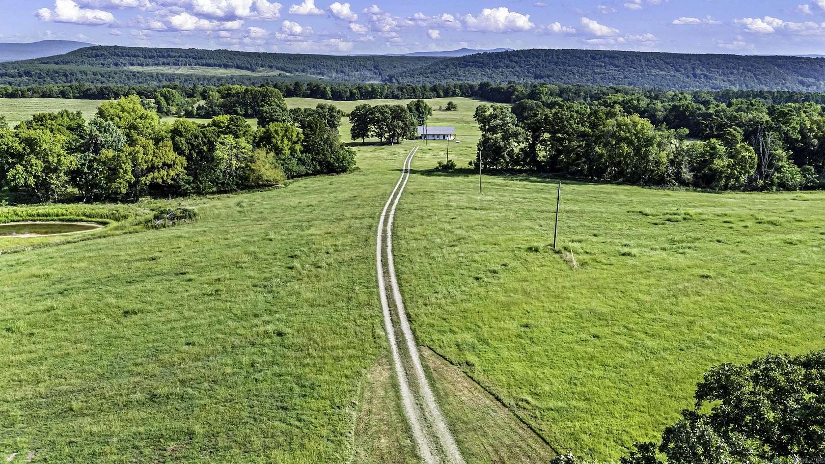 57 Acres of Land with Home for Sale in Lamar, Arkansas