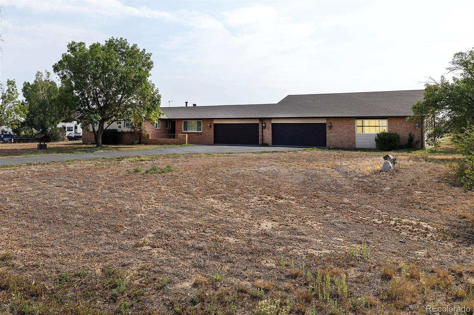 1.84 Acres of Land with Home for Sale in Brighton, Colorado