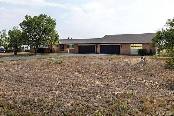 1.84 Acres of Land with Home for Sale in Brighton, Colorado