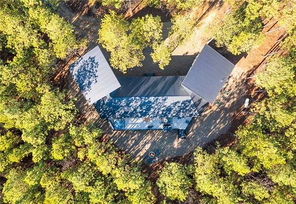 1.57 Acres of Land with Home for Sale in Broken Bow, Oklahoma
