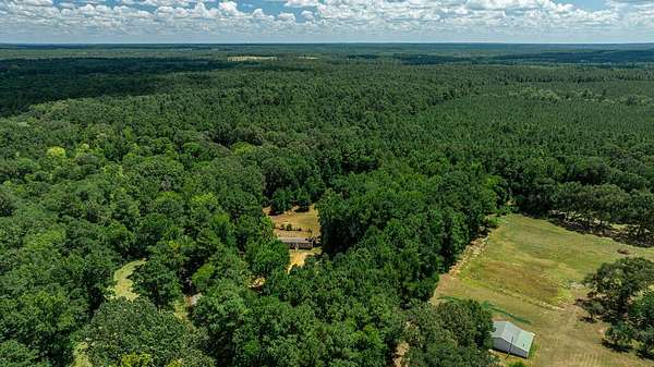 7.15 Acres of Land with Home for Sale in San Augustine, Texas