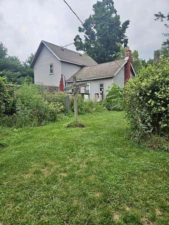5 Acres of Land with Home for Sale in Allen, Michigan